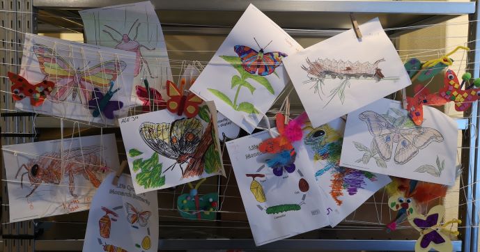 children's artwork on display in the gallery